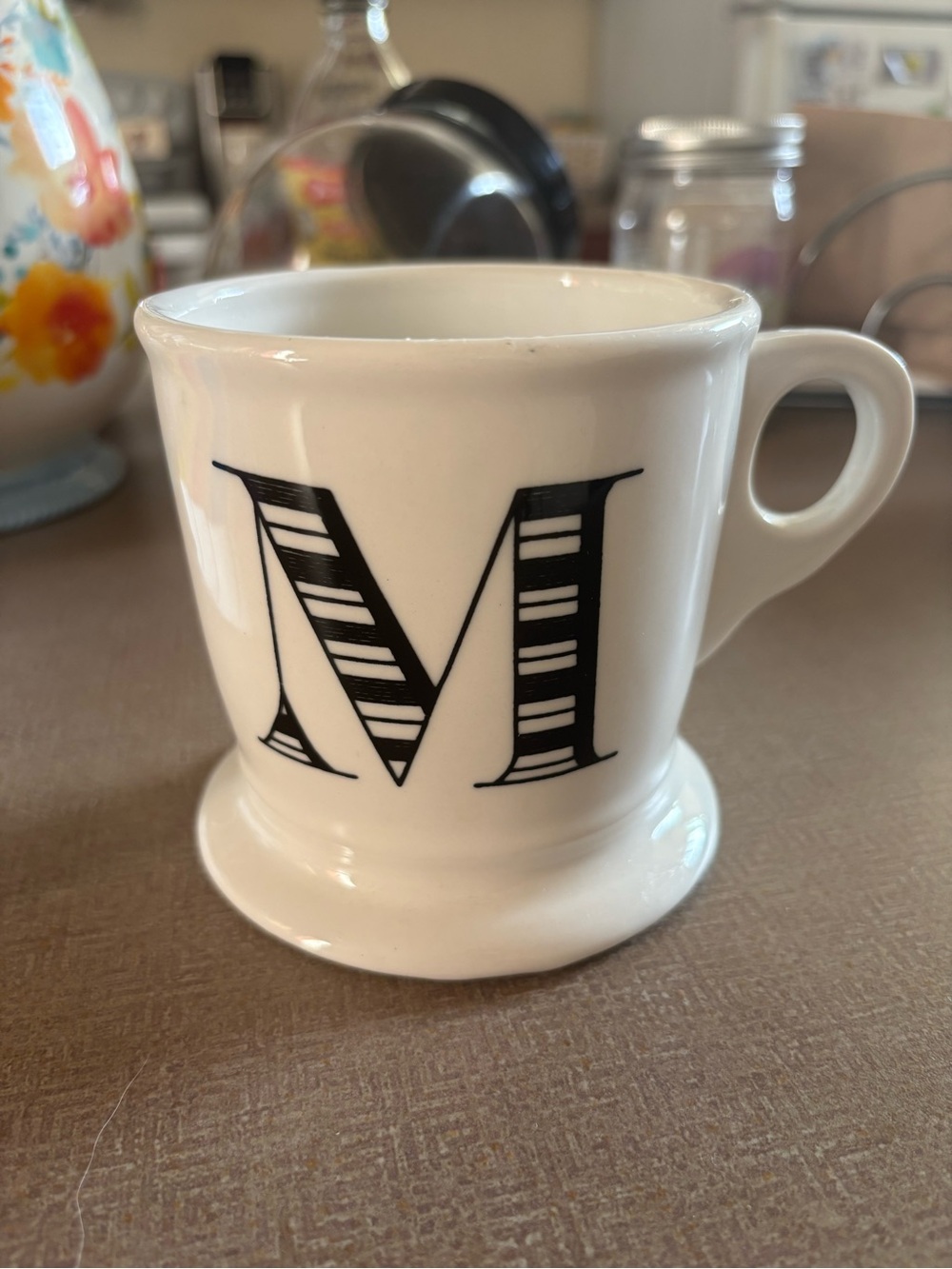 Anthropologie White Ceramic Mug with Black Striped 'M'